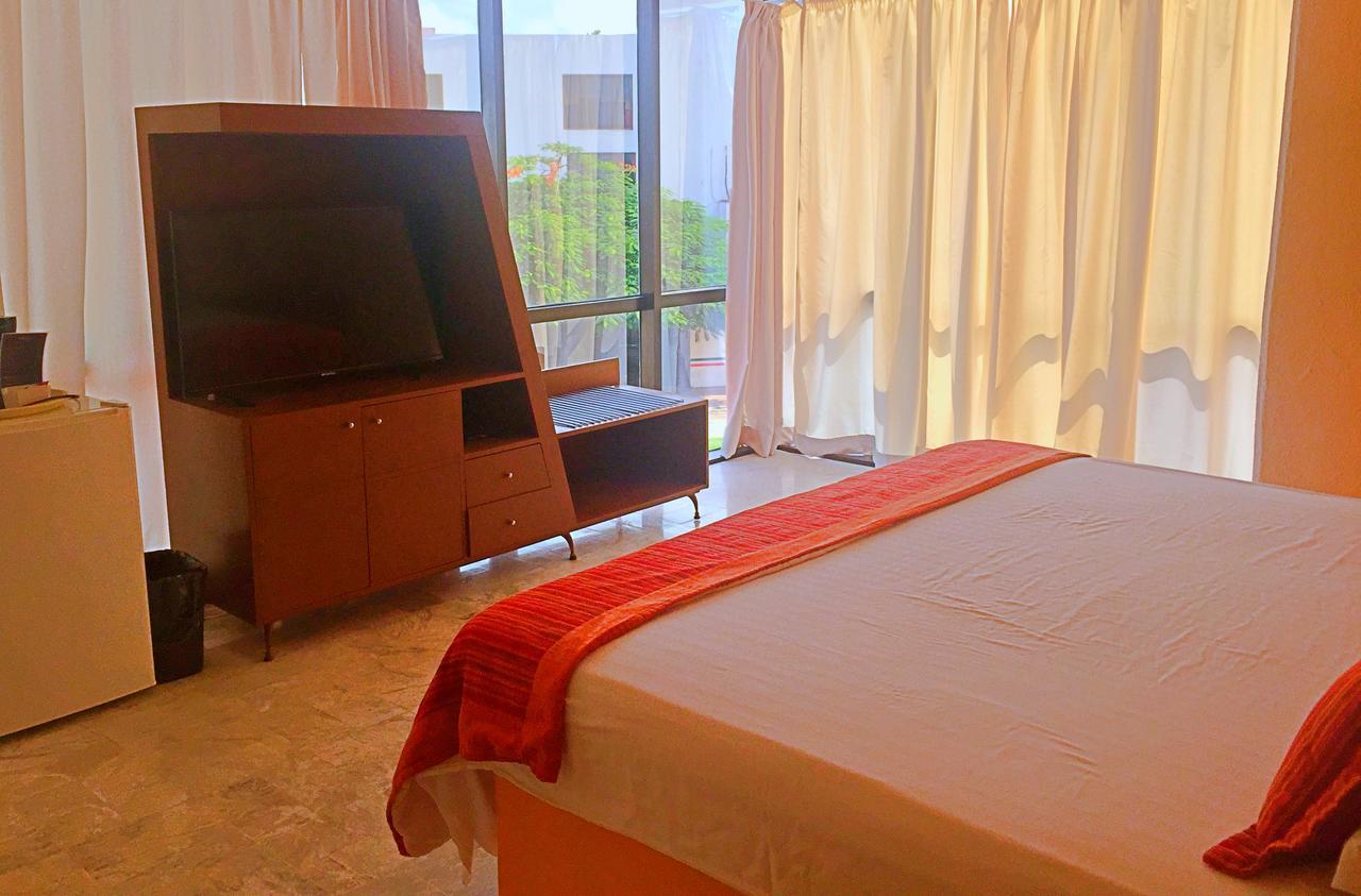 Hotel Versalles Suites Cancún Exterior foto