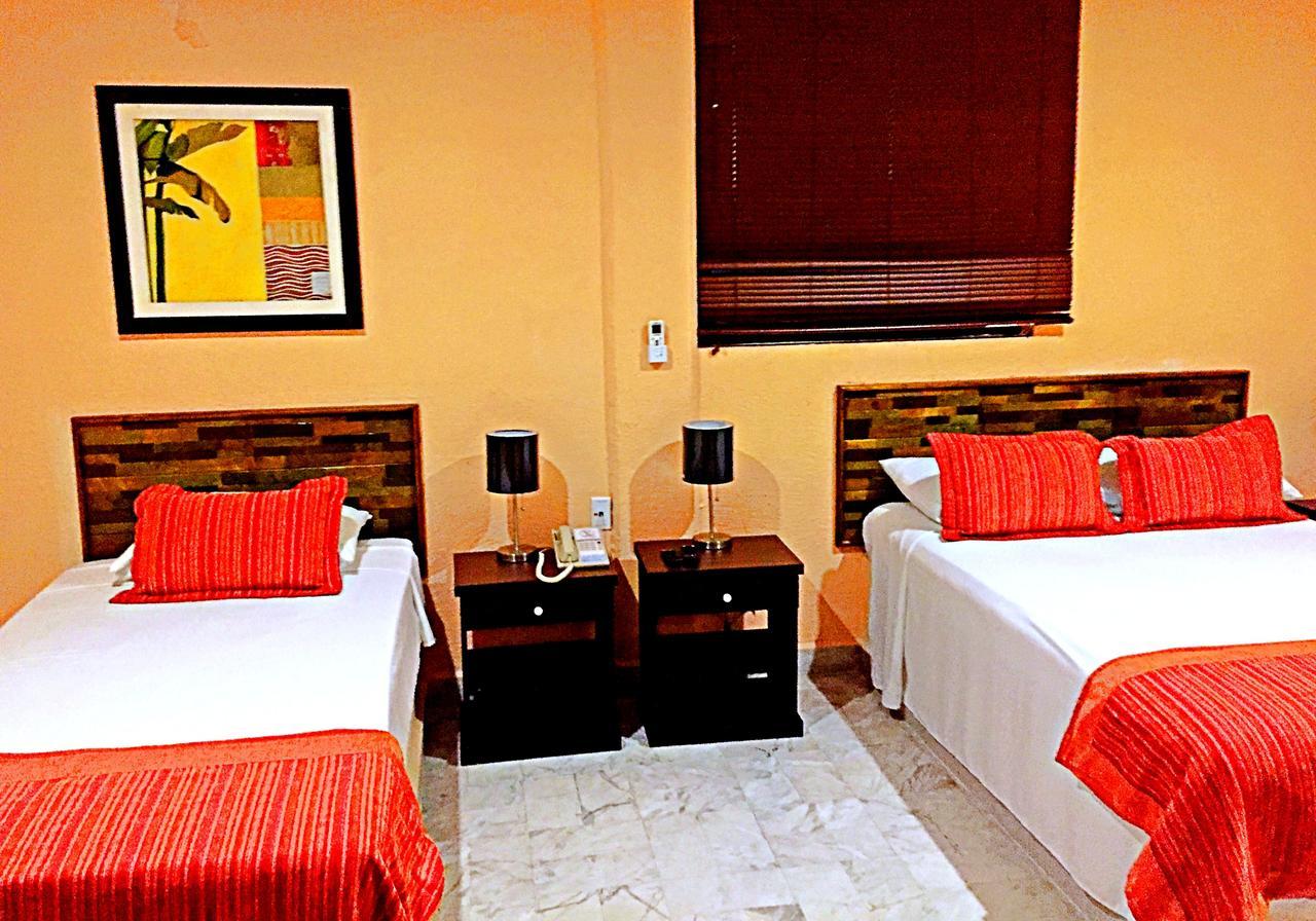 Hotel Versalles Suites Cancún Exterior foto